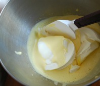 Fold the marscapone cheese into the yolk mixture.